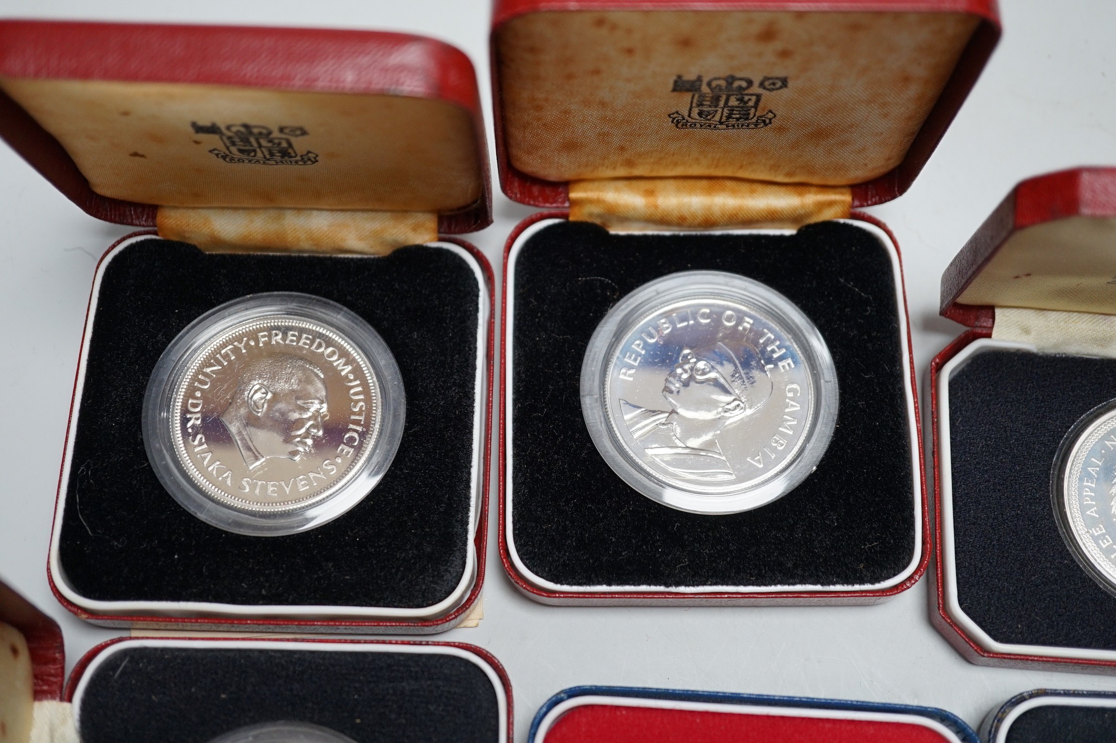 Eight Royal Mint proof silver crowns and six Pobjoy Mint silver crowns